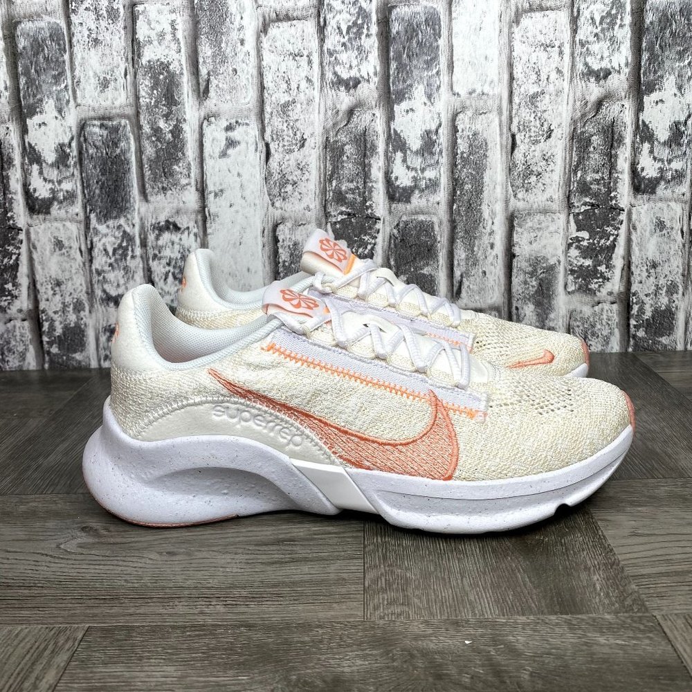Nike Women's Sneakers in Cream and Orange